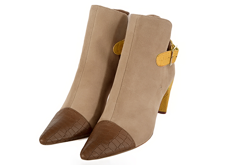 Caramel brown, tan beige and mustard yellow women's ankle boots with buckles at the back. Tapered toe. High slim heel. Front view - Florence KOOIJMAN